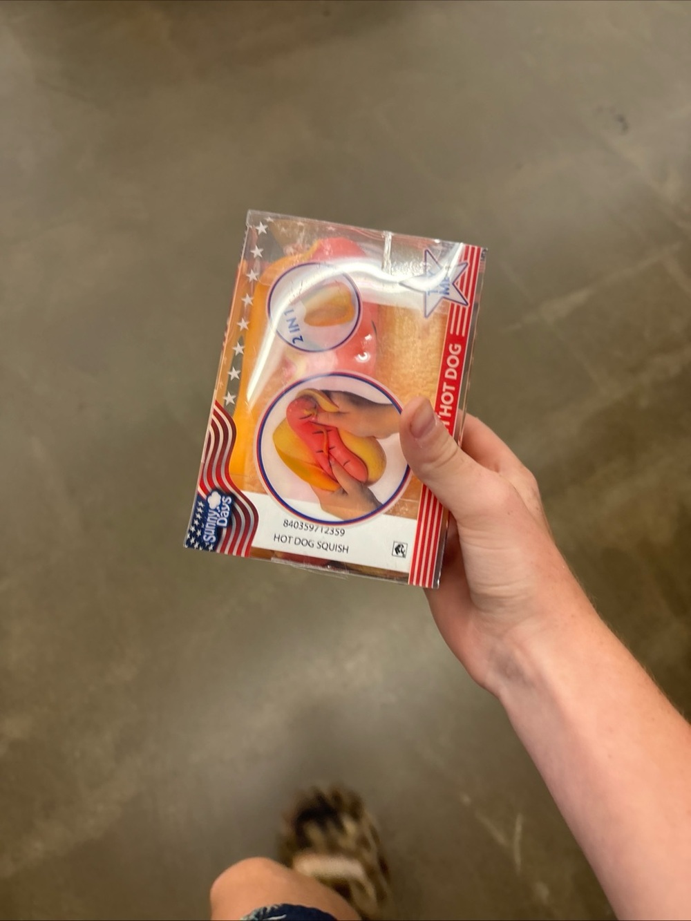 Squish Hot Dog Stress Toy - Yellow & Pink tape is cut tho to see if it was poppd